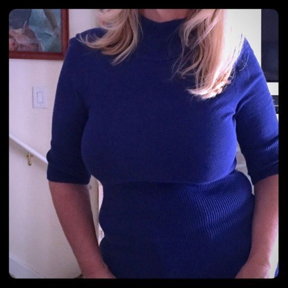 Blue sweater with low cut back
